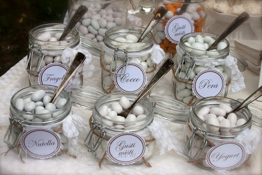 Mason jars filled with different flavors of the famous Sulmona confetti in Abruzzo Italy.