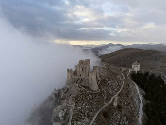 The castle at Rocca Calascio just as the fog sets in on one of the beautiful castles in Abruzzo.