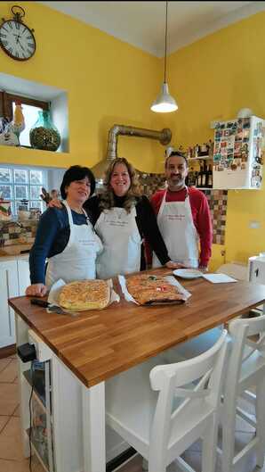 Rosam Margaret and Domenico baking Easter Bread in La Rocca Mia House B&B kitchen.