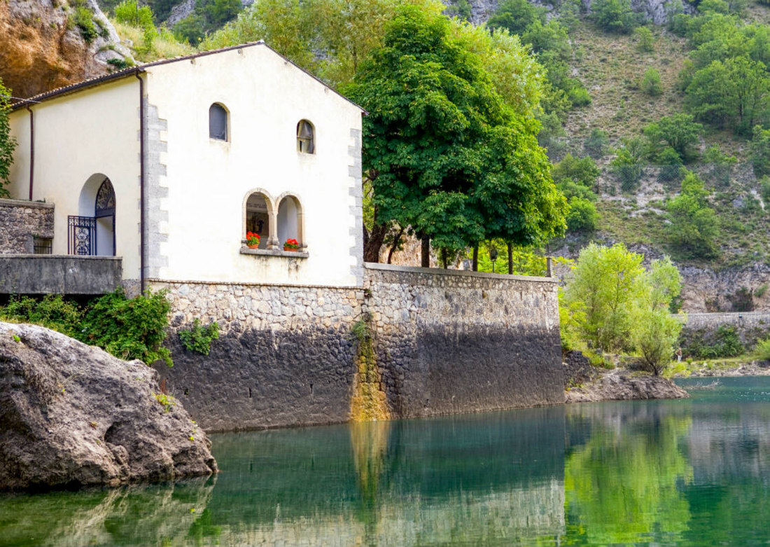 Hermitage of San Domenico on the lake of the same name in Villalago, Italy.